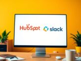 A workspace with HubSpot and Slack logos on a computer.